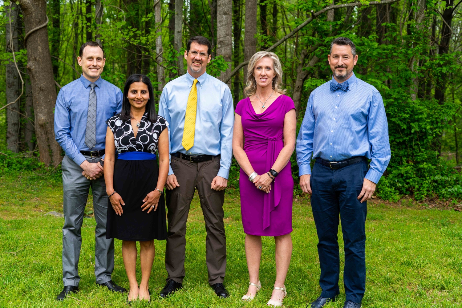 3 Neurologists & 2 Physicians Assistants from Asheville Neurology Specialists Standing In The Woods